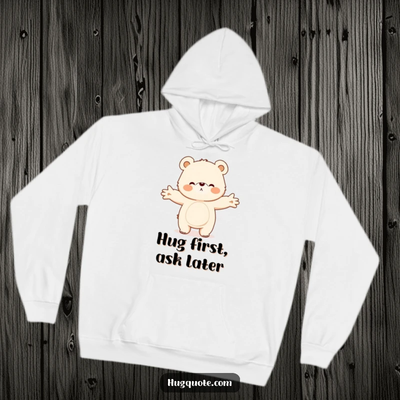 Funny hoodie showcasing a fluffy bear character reaching out with open arms, ready to give an enormous, heartwarming hug.
